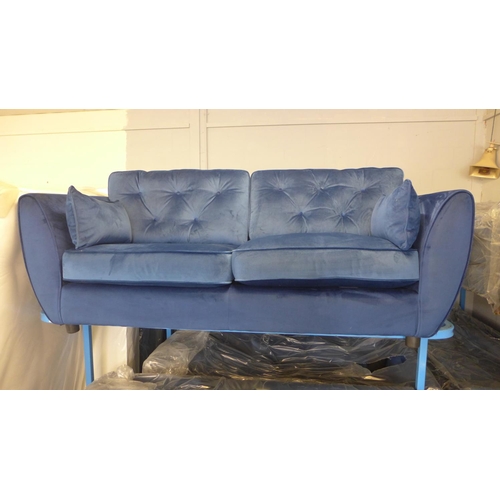 1657 - A Hoxton deep ocean blue velvet three seater sofa