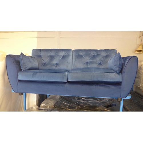 1663 - A Hoxton deep ocean blue velvet three seater sofa