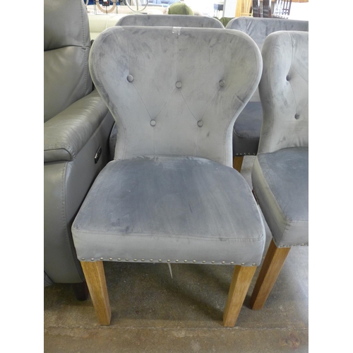 1478 - A set of four Arlo grey button back and studded velvet dining chairs *This Lot is Subject to VAT*