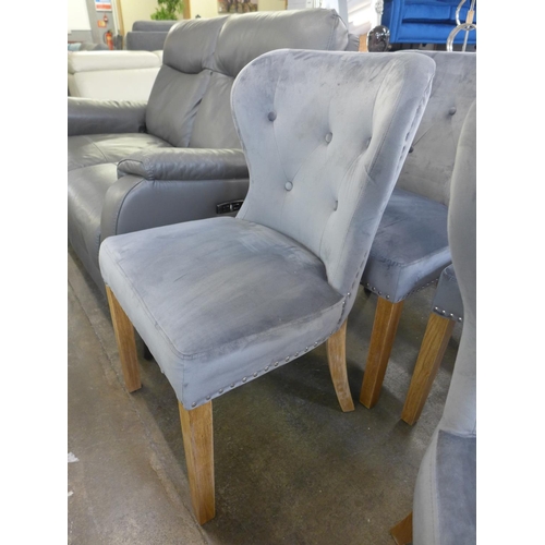 1478 - A set of four Arlo grey button back and studded velvet dining chairs *This Lot is Subject to VAT*