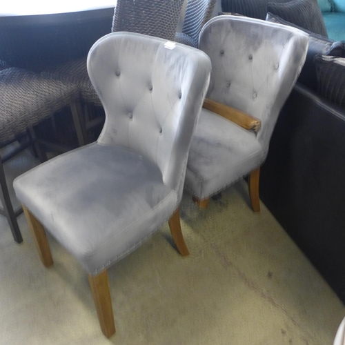 1667 - A pair of Arlo grey button back velvet chairs and a Hugo taupe velvet chair - damaged *This lot is s... 