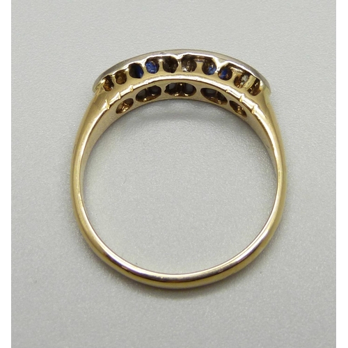 1011 - A yellow metal, sapphire and diamond ring, stamped 18ct, 4.1g, Q