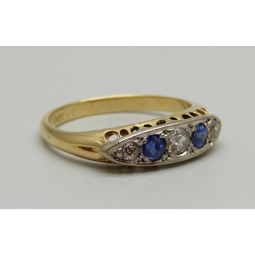 1011 - A yellow metal, sapphire and diamond ring, stamped 18ct, 4.1g, Q