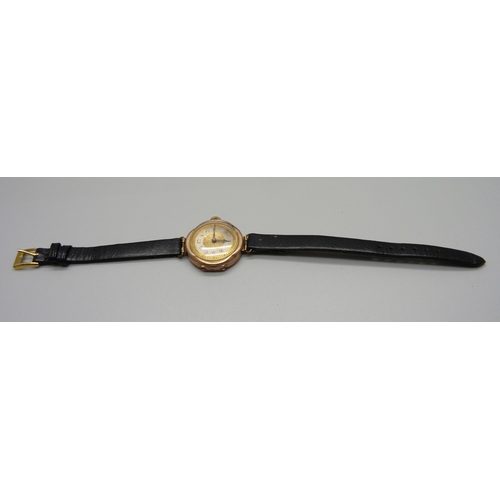 1031 - A 9ct gold cased wristwatch