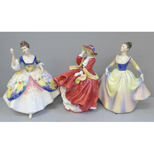 606 - Three Royal Doulton figures; Christine, Lisa, Top o' The Hill and a wooden base, Top o' The Hill wit... 