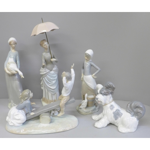 610 - Four Lladro figures including dog and children on see-saw, one other similar of a lady with umbrella