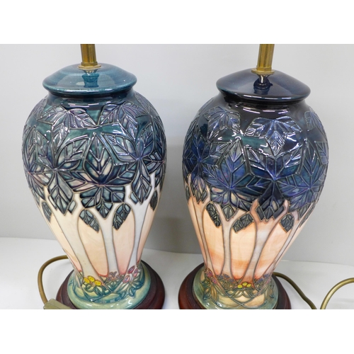 613 - A pair of Moorcroft Cloony table lamps, 30cm