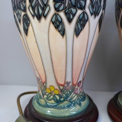 613 - A pair of Moorcroft Cloony table lamps, 30cm