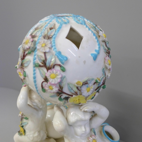 621 - A Minton porcelain cherub centrepiece, a/f