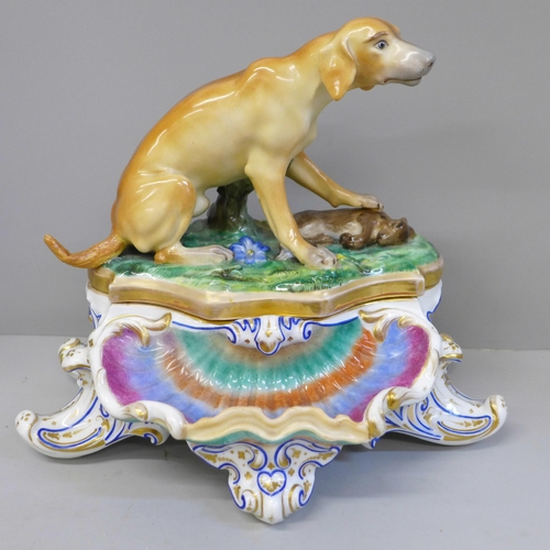 622 - A Paris Porcelain table ink stand with a model of a dog on the lid, tail restored