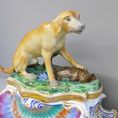 622 - A Paris Porcelain table ink stand with a model of a dog on the lid, tail restored