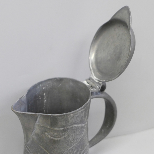 626 - A Liberty & Co Tudric pewter lidded jug, designed by Archibald Knox