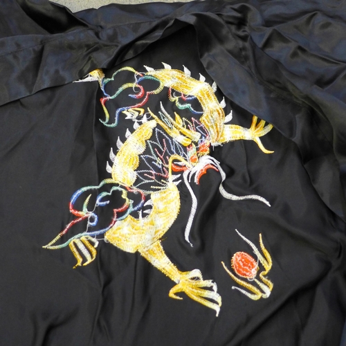 653 - A dressing gown with embroidered dragon design, from Hong Kong