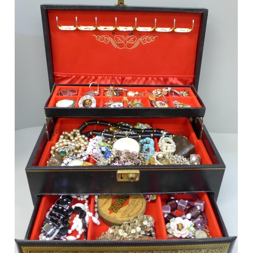 674 - A jewellery case and costume jewellery