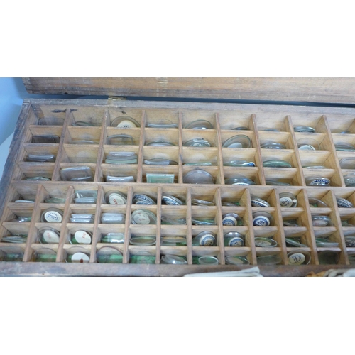 675 - A collection of watch glasses and another box containing trench watch glasses