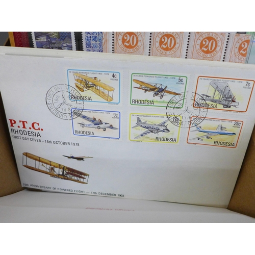 695 - Stamps; a box of stamp albums, covers, presentation packs, etc.