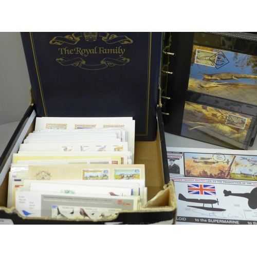 698 - Stamps; a box of covers in albums (World Wildlife Fund and Princess Diana) together with loose first... 