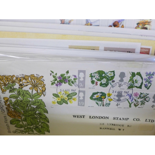 698 - Stamps; a box of covers in albums (World Wildlife Fund and Princess Diana) together with loose first... 