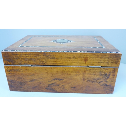 706 - An inlaid wooden sewing box