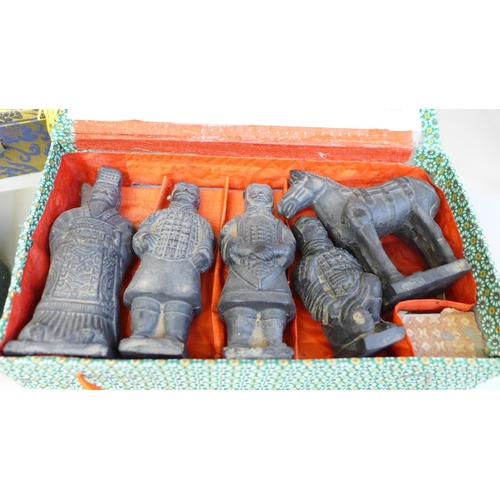 708 - A Chinese scroll, fan and Terracotta Army figures