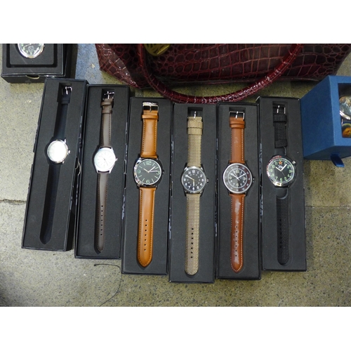 740 - A collection of boxed wristwatches