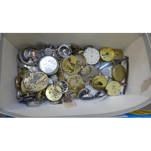 749 - A box of wristwatch case backs and bezels and a collection of pocket watch dials and parts