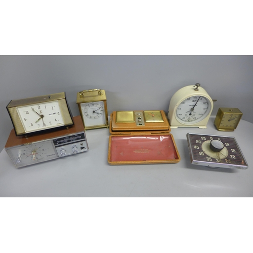 780 - A collection of retro clocks, a Smiths darkroom timer, Swiza travel clock, etc. (7)