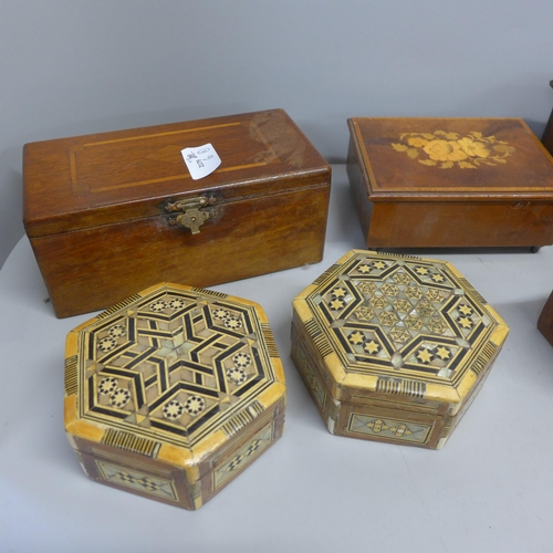 784 - Nine decorative carved and inlaid wooden boxes