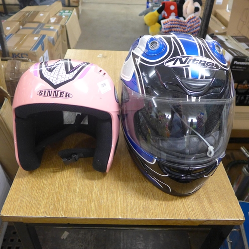 2334 - Nitro motorcycle helmet and a sinner ski/snowboarding helmet