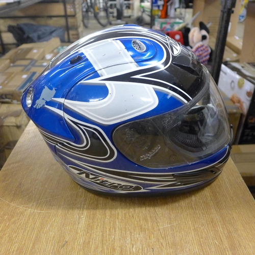 2334 - Nitro motorcycle helmet and a sinner ski/snowboarding helmet