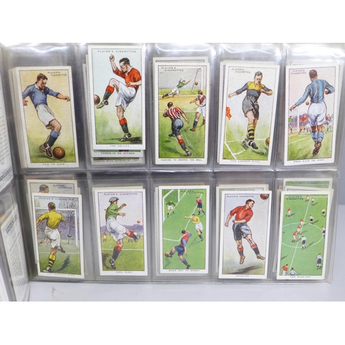 802 - Cigarette cards; an album containing twelve complete sets of Players cards including Poultry, Britis... 