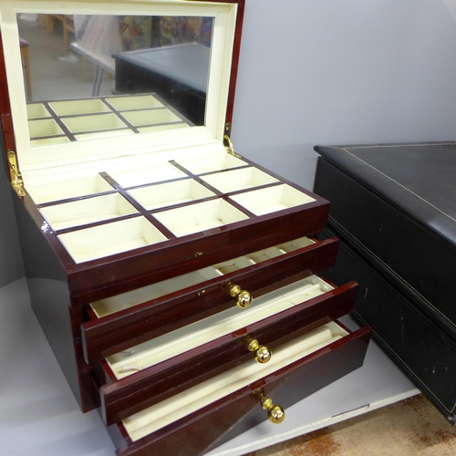 812 - Two large leather covered jewellery boxes, a Tuscan jewellery case and a four drawer lacquered jewel... 