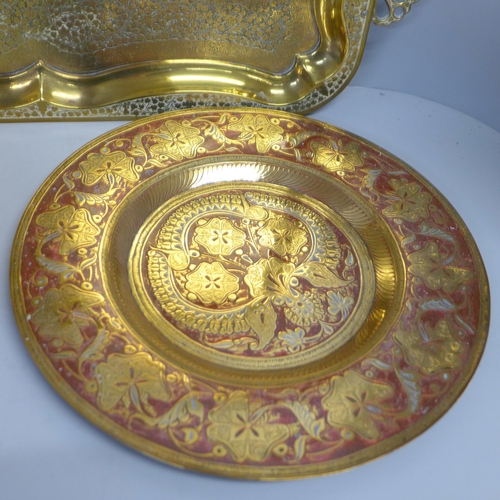 819 - A two-handled brass tray, copper bowl and brass plate or tray