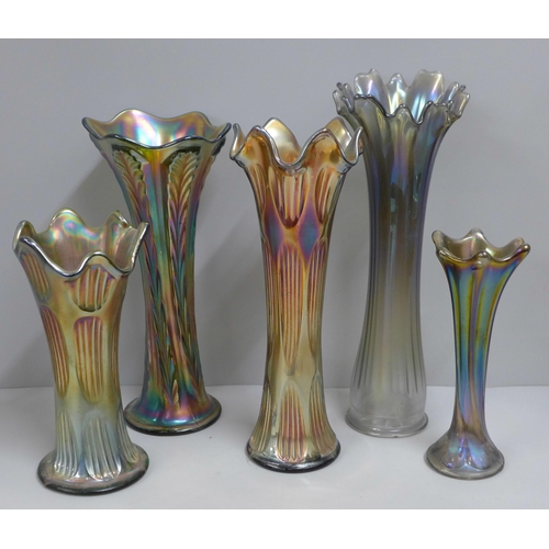 825 - Two Fenton diamond and rib carnival glass vases and three others