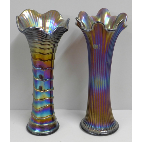 828 - An Imperial Glass Company ripple carnival glass vase and a Northwood fine rib iridescent glass vase