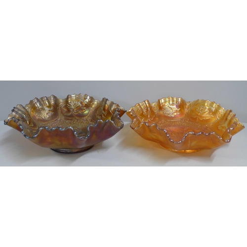 829 - Two carnival glass Dragon and Lotus bowls, marigold and smoky brown, possibly Butler Brothers