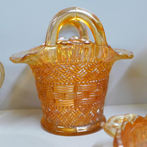 850 - Ten items of marigold carnival glass, Dugan basket, two handled mug, hat vase, etc. **PLEASE NOTE TH... 