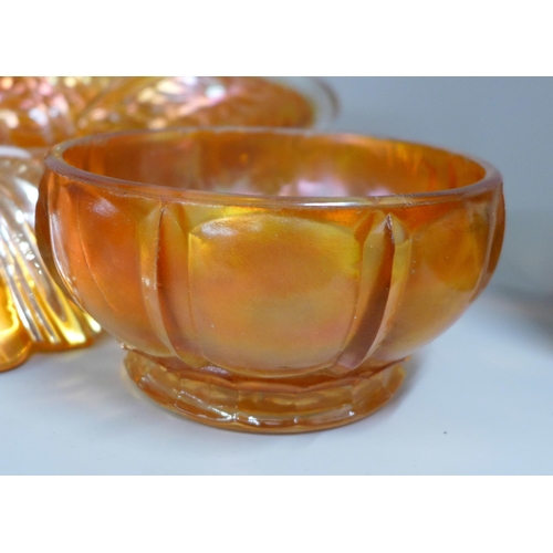 855 - Ten items of marigold carnival glass including a large oval bowl and a small vase **PLEASE NOTE THIS... 