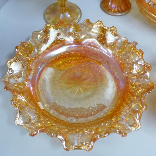 855 - Ten items of marigold carnival glass including a large oval bowl and a small vase **PLEASE NOTE THIS... 