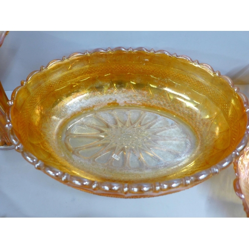 855 - Ten items of marigold carnival glass including a large oval bowl and a small vase **PLEASE NOTE THIS... 