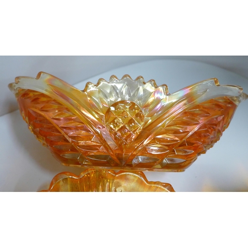 855 - Ten items of marigold carnival glass including a large oval bowl and a small vase **PLEASE NOTE THIS... 