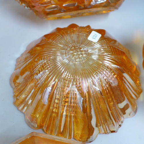 855 - Ten items of marigold carnival glass including a large oval bowl and a small vase **PLEASE NOTE THIS... 