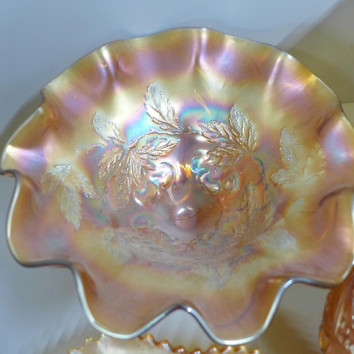 857 - Ten items of marigold carnival glass, butterfly dish, pedestal bowl, kokomo rose bowl, etc. **PLEASE... 