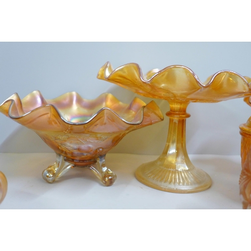 857 - Ten items of marigold carnival glass, butterfly dish, pedestal bowl, kokomo rose bowl, etc. **PLEASE... 