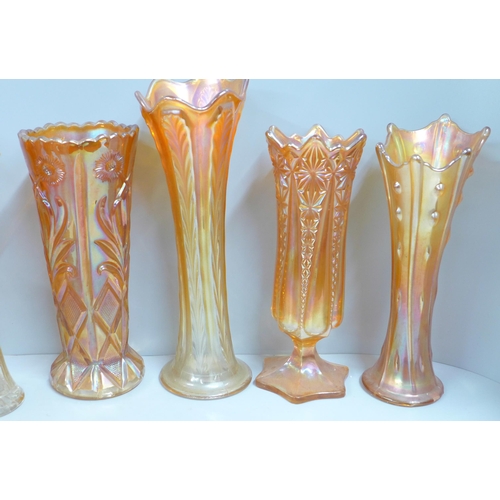 858 - A collection of thirteen carnival glass vases in marigold **PLEASE NOTE THIS LOT IS NOT ELIGIBLE FOR... 