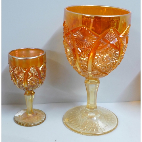 863 - Ten items of marigold carnival glass, three goblets and a two handled basket, etc. **PLEASE NOTE THI... 