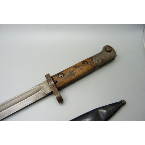 882 - A WWI bayonet and scabbard