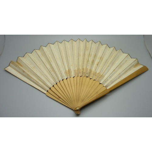 891 - A late 18th/early 19th century paper-leaf fan decorated with 'Twelve of the most famous Country Danc... 