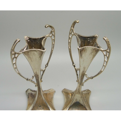 896 - A pair of Arts and Crafts silver vases, Birmingham 1908, 14.5cm