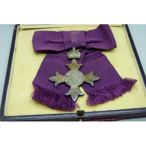 916 - A silver MBE medal, cased